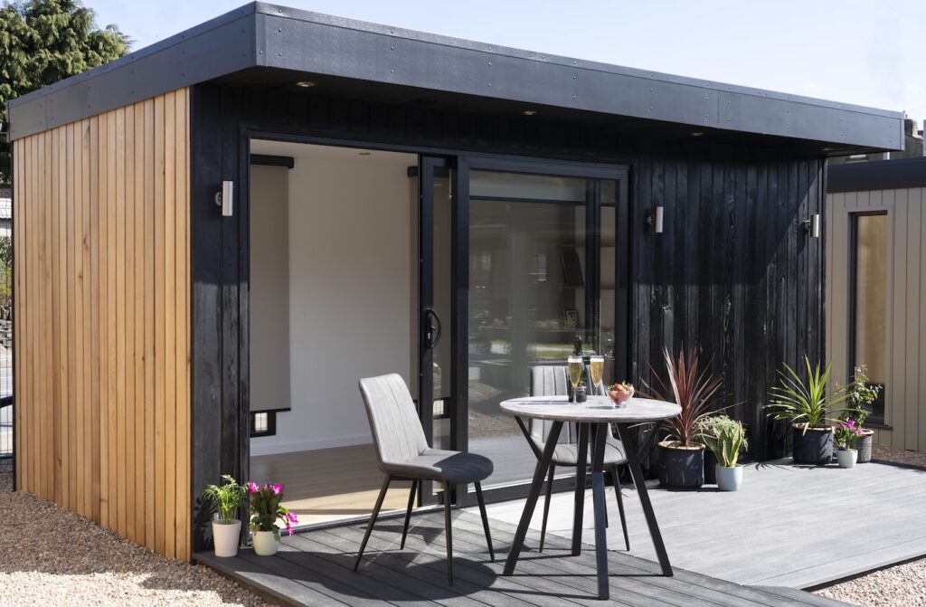 Garden Studio with sliding doors and an overhang at the front
